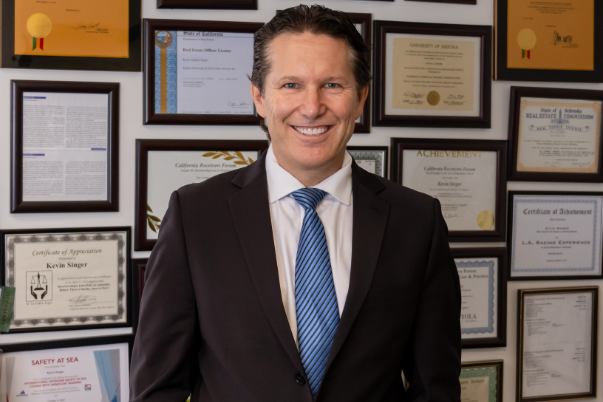 Picture of Kevin Singer: Court Receiver Los Angeles sitting at his office desk